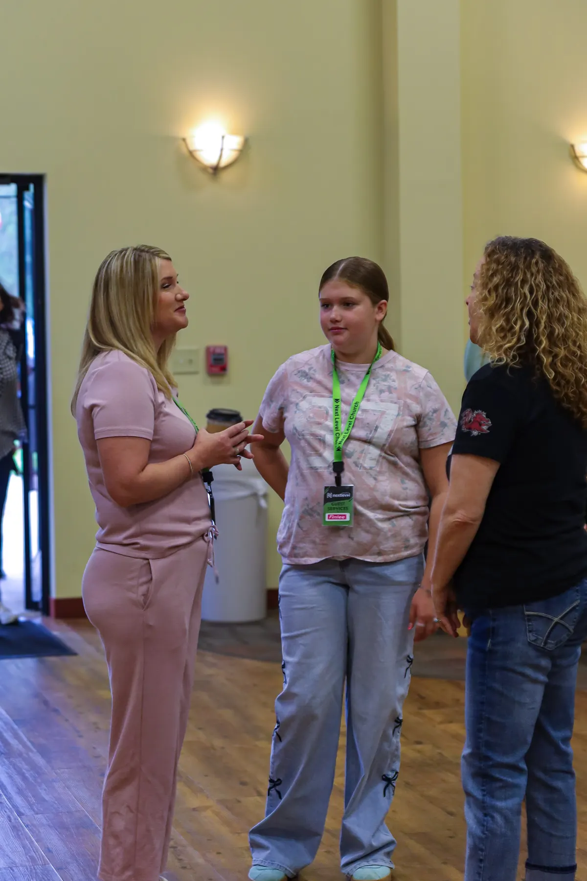 People connecting and talking after a Sunday service at Next Level Church